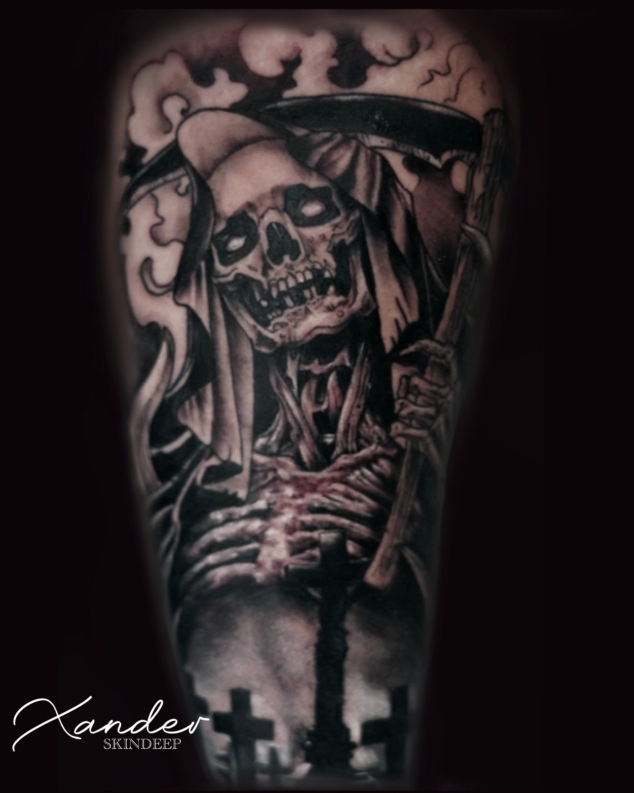 Black and grey armored character tattoo